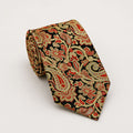 A rolled George Neale gold and red paisley silk tie.