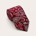 A rolled George Neale burgundy paisley silk tie.
