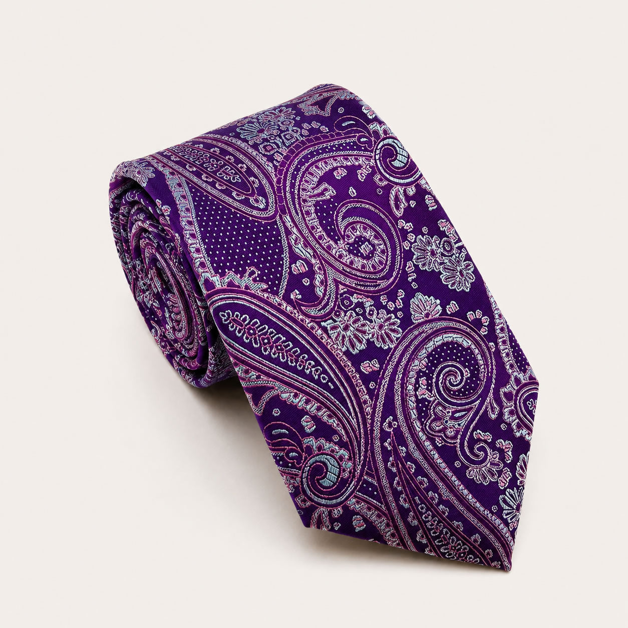 A rolled George Neale purple paisley silk tie.