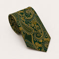 A rolled George Neale dark green and gold paisley silk tie.