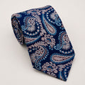 A rolled George Neale navy and champagne paisley silk tie.