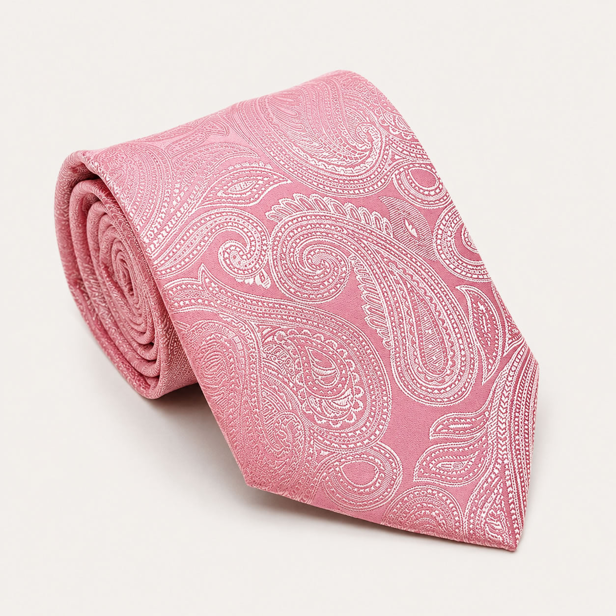A rolled George Neale pink paisley silk tie.