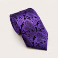 A rolled George Neale purple and black paisley silk tie.