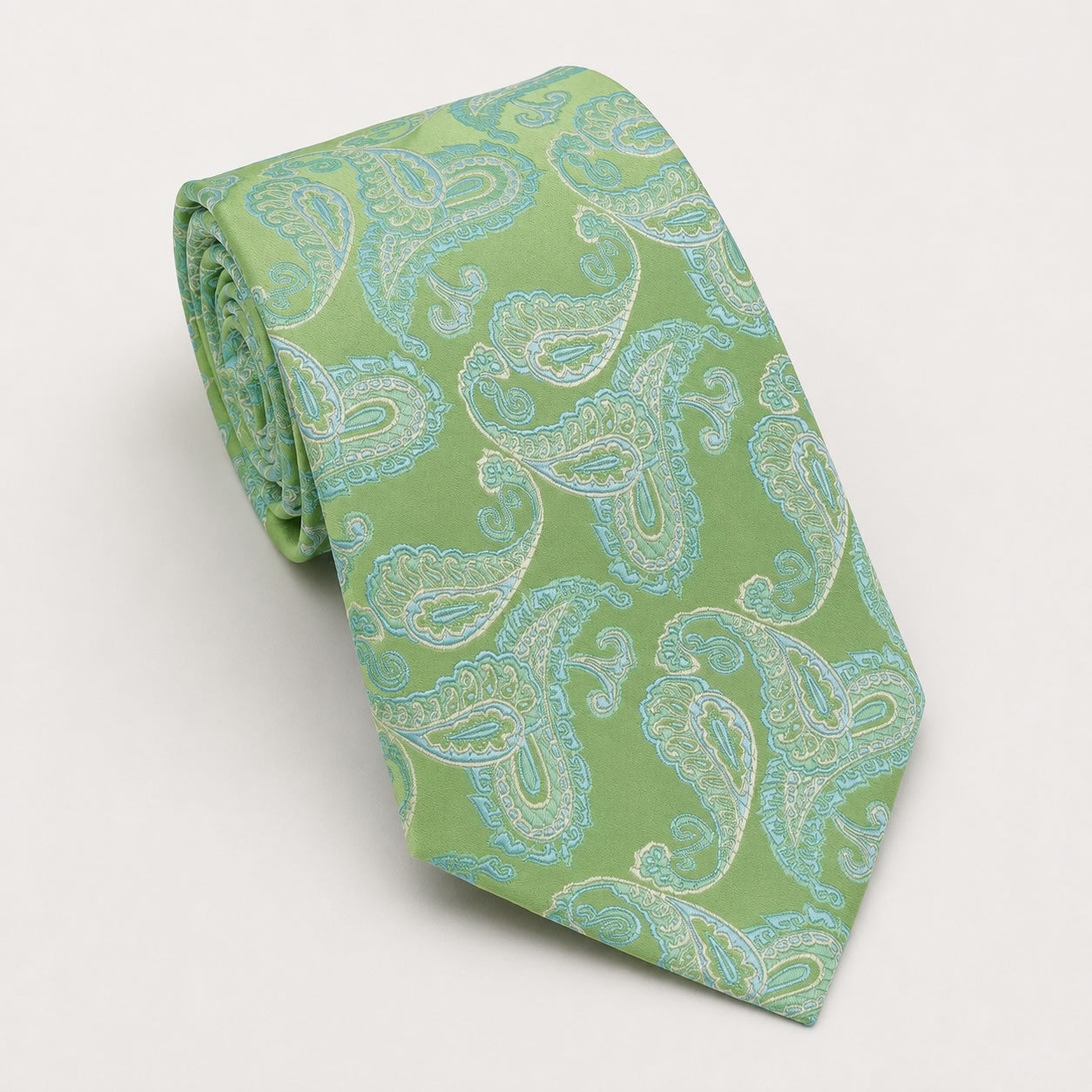 A rolled George Neale green paisley silk tie.