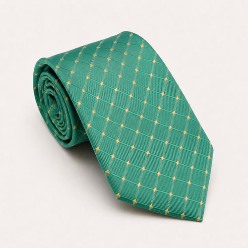 A rolled George Neale aquamarine and gold polka dot silk tie.