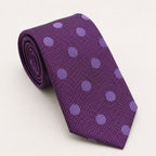 A rolled George Neale purple polka dot silk tie.