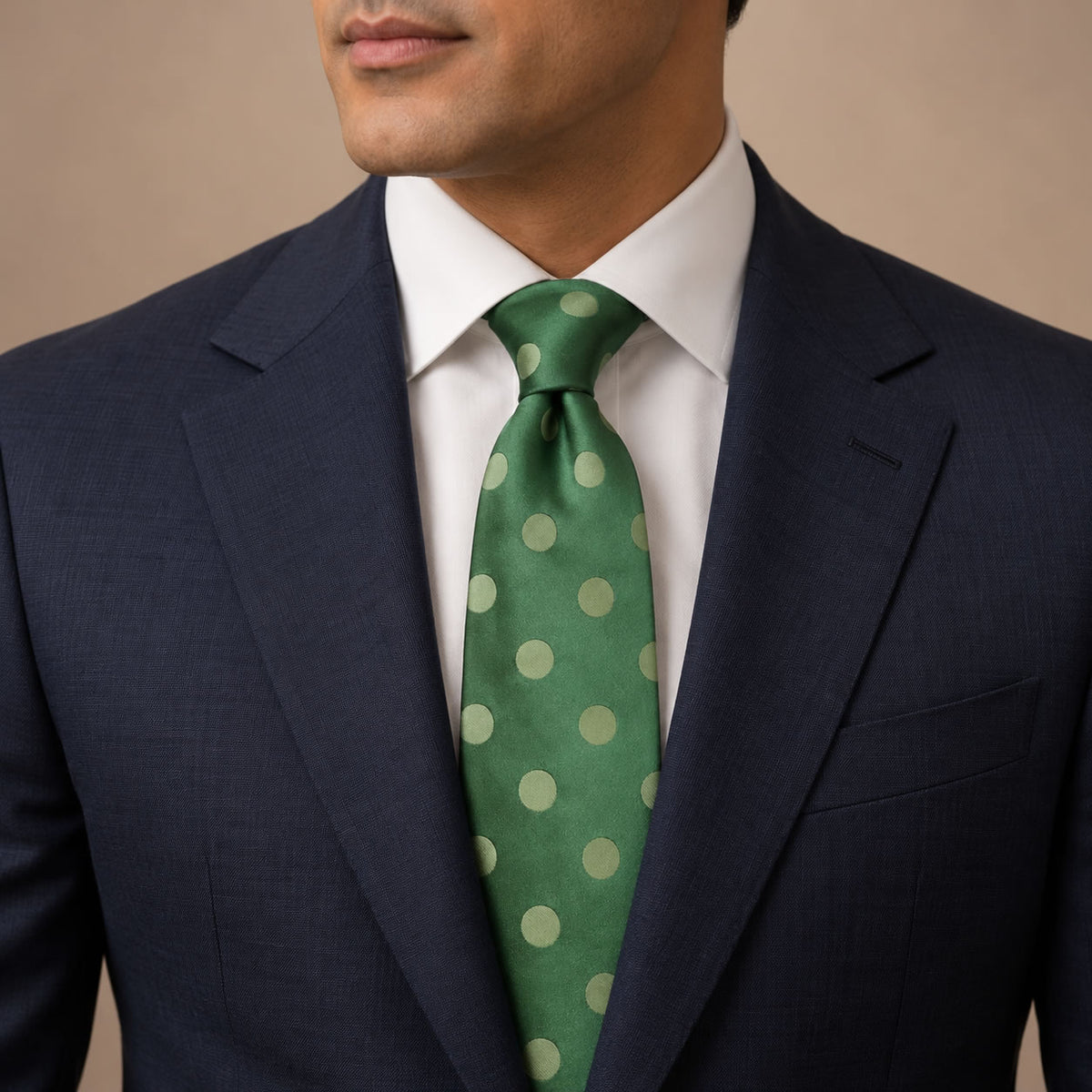 Forest Green Polka Dot Silk Tie by George Neale, worn by a model with a suit and shirt