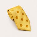 A rolled George Neale lemon polka dot silk tie.