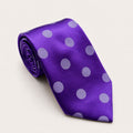 A rolled George Neale royal purple polka dot silk tie.