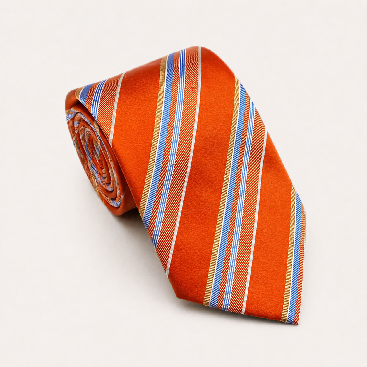 A rolled George Neale orange and blue stripe silk tie.
