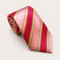 A rolled George Neale pink and gold stripe silk tie.