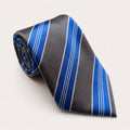 A rolled George Neale slate and blue stripe silk tie.