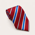 A rolled George Neale burgundy and blue stripe silk tie.