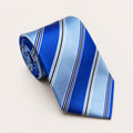 A rolled George Neale blue stripe silk tie.