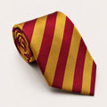 A rolled George Neale red and yellow stripe silk tie.