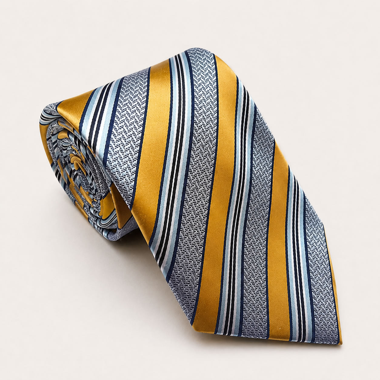 A rolled George Neale silver and gold stripe silk tie.