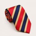 A rolled George Neale red and navy stripe silk tie.