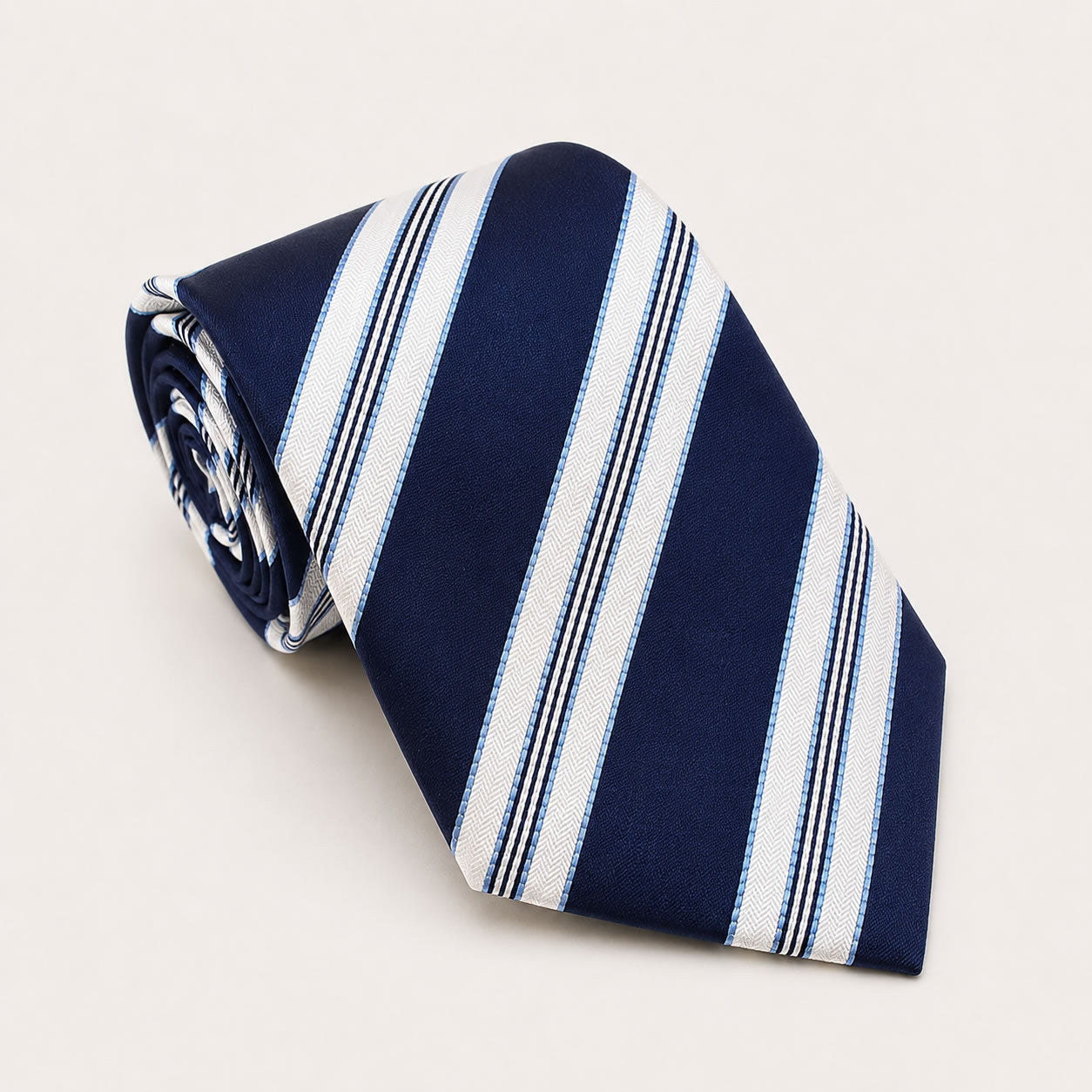 A rolled George Neale navy and white stripe silk tie.