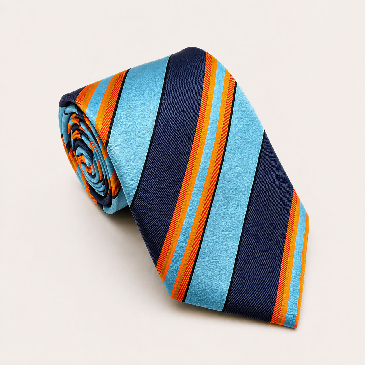A rolled George Neale blue and orange stripe silk tie.