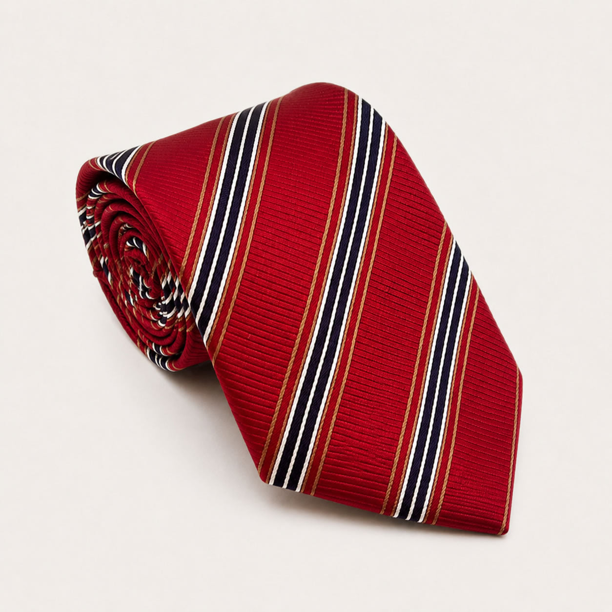 A rolled George Neale red and navy stripe silk tie.
