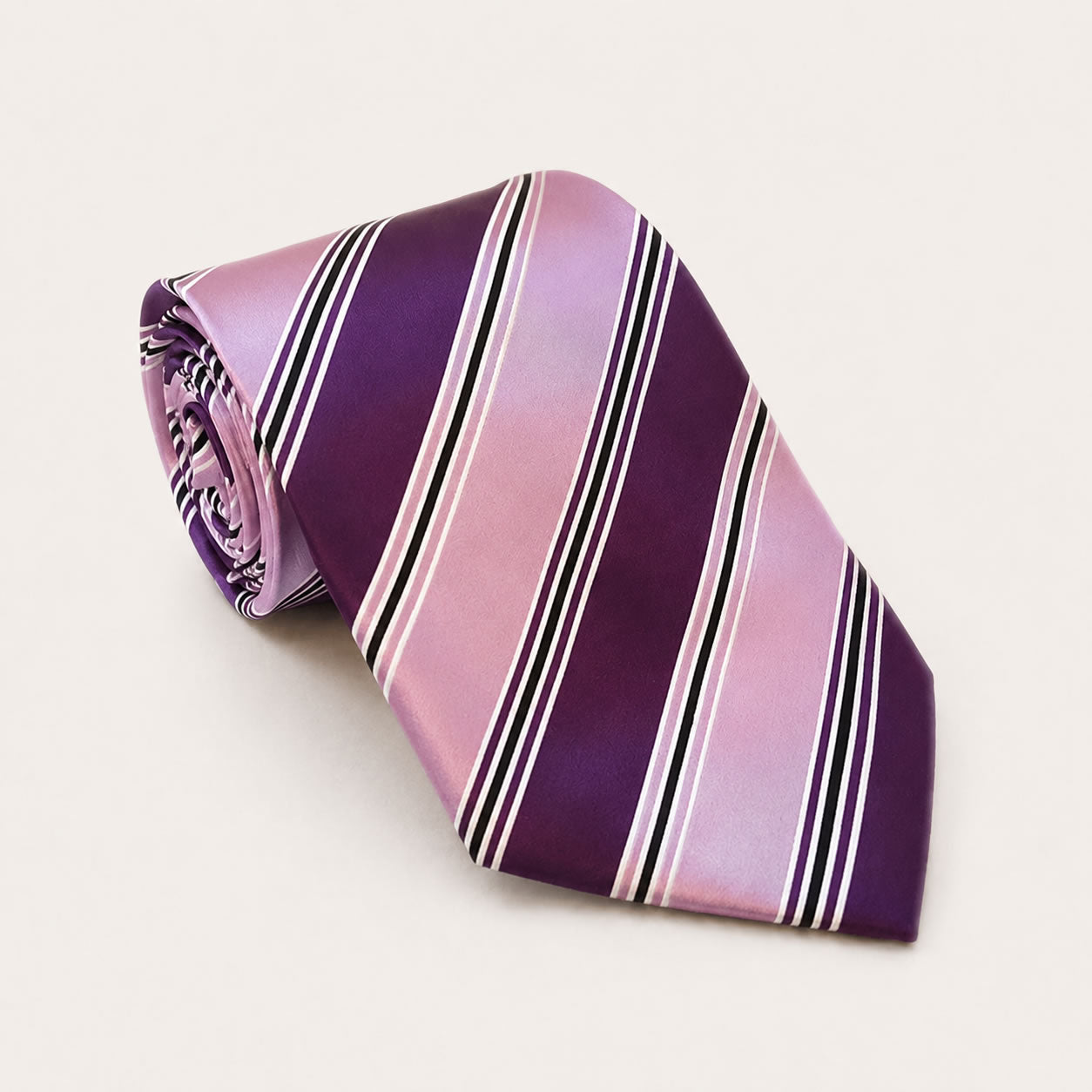 A rolled George Neale purple and lilac stripe silk tie.