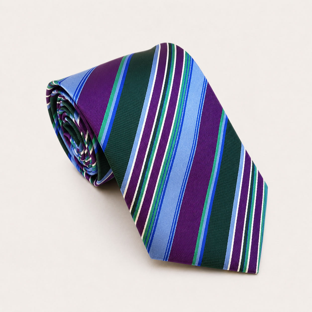 A rolled George Neale purple multi-stripe silk tie.