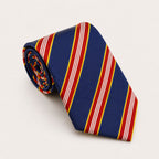 A rolled George Neale navy and red stripe silk tie.