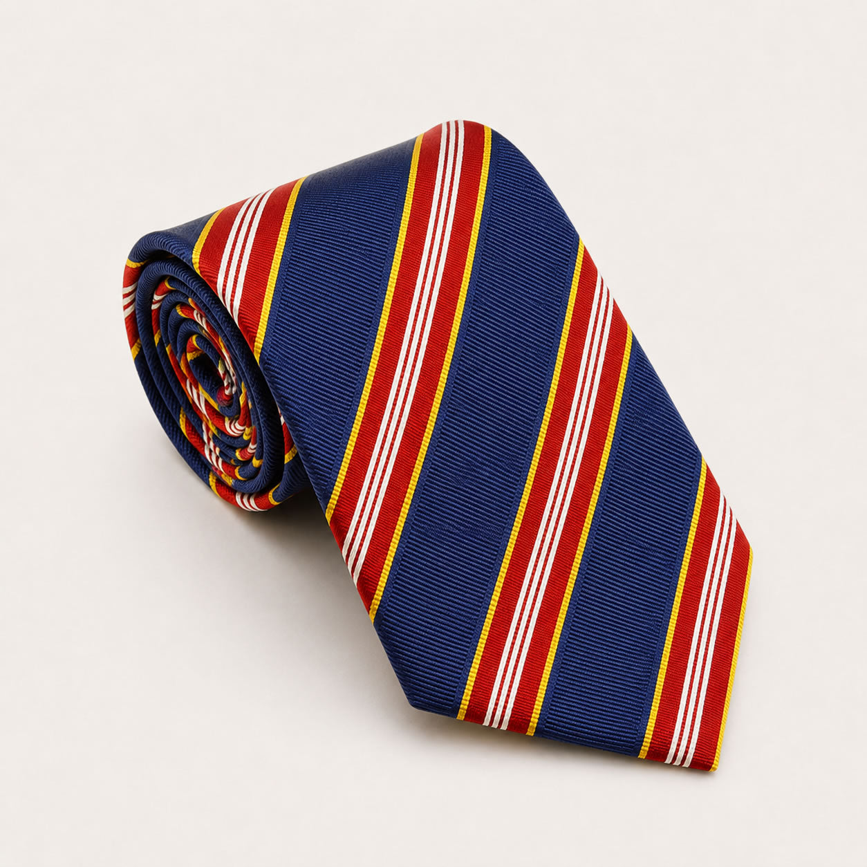 A rolled George Neale navy and red stripe silk tie.