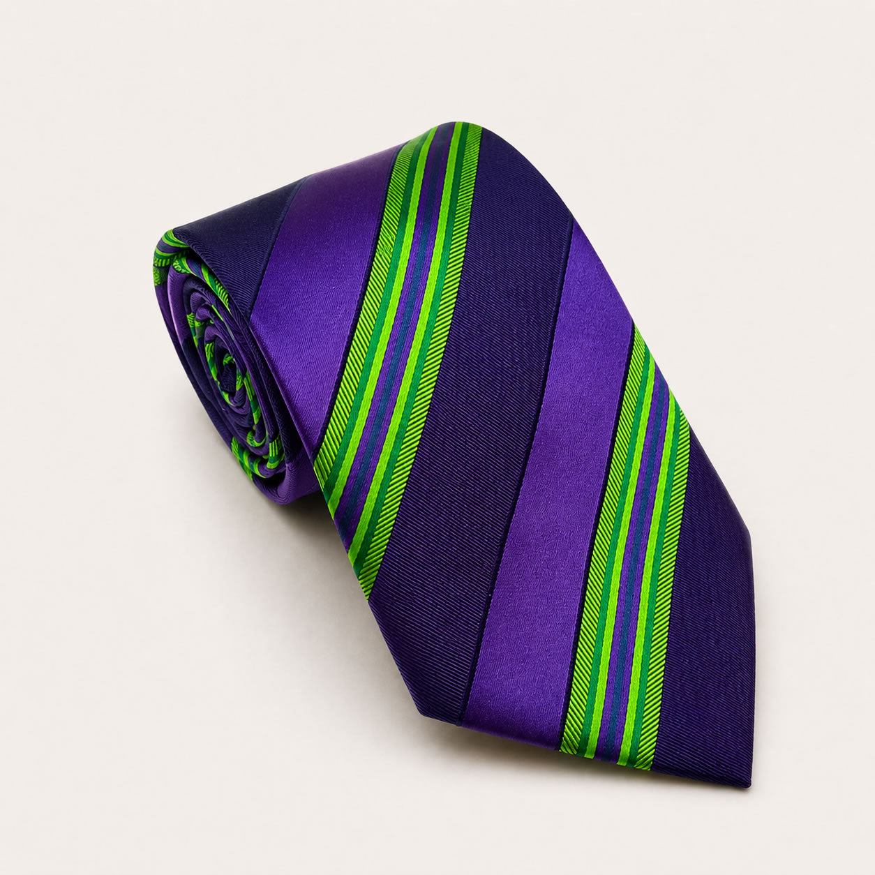 A rolled George Neale purple and green stripe silk tie.