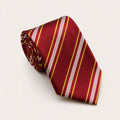 A rolled George Neale burgundy and gold stripe silk tie.