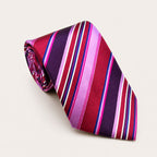 A rolled George Neale pink multi-stripe silk tie.