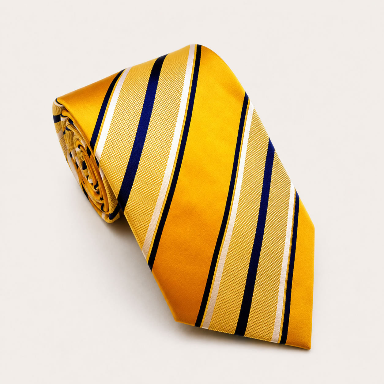 A rolled George Neale yellow and navy stripe silk tie.