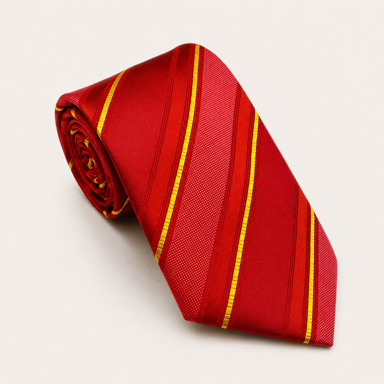 A rolled George Neale red and gold stripe silk tie.