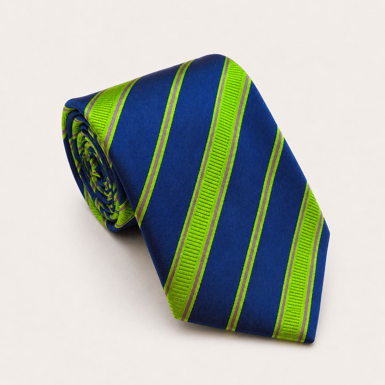 A rolled George Neale blue and green stripe silk tie.