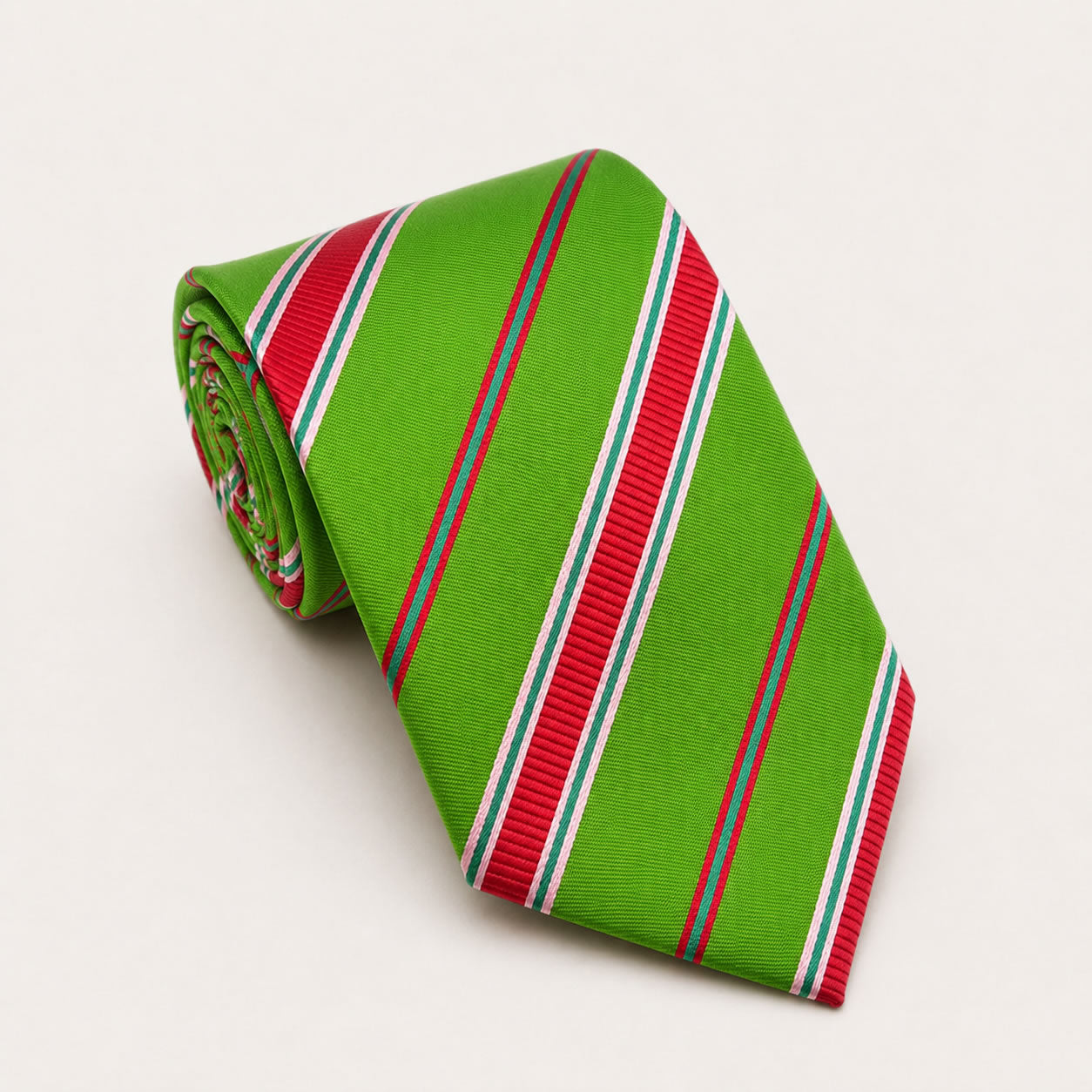 A rolled George Neale green and red stripe silk tie.