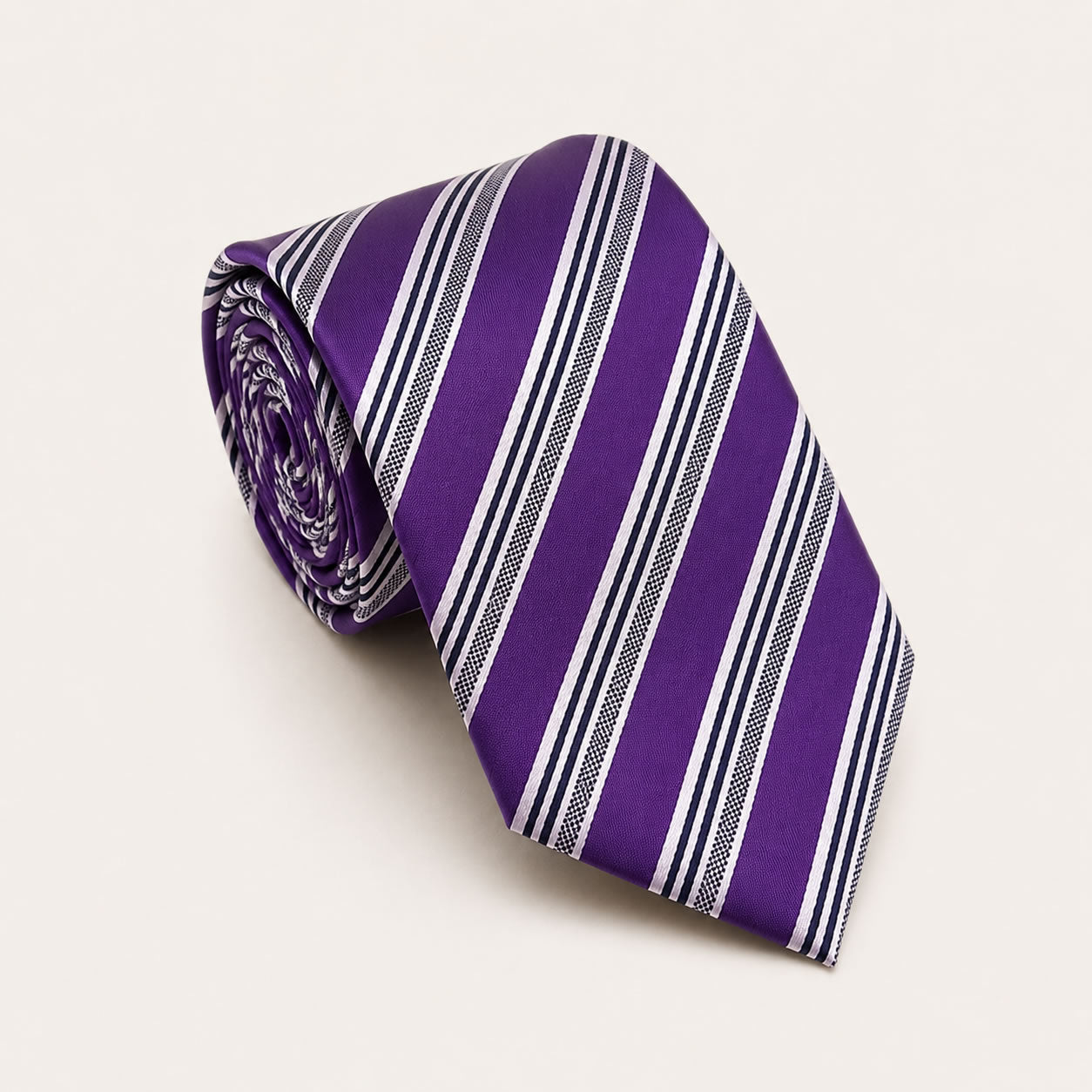 A rolled George Neale purple stripe silk tie.
