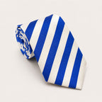 A rolled George Neale blue and white stripe silk tie.