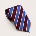 A rolled George Neale maroon and blue stripe silk tie.